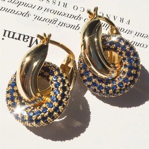 LUV AJ pave interlock Blue Sapphire and Gold